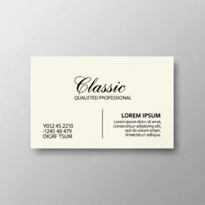 a simple, cream-colored business card with cursive font